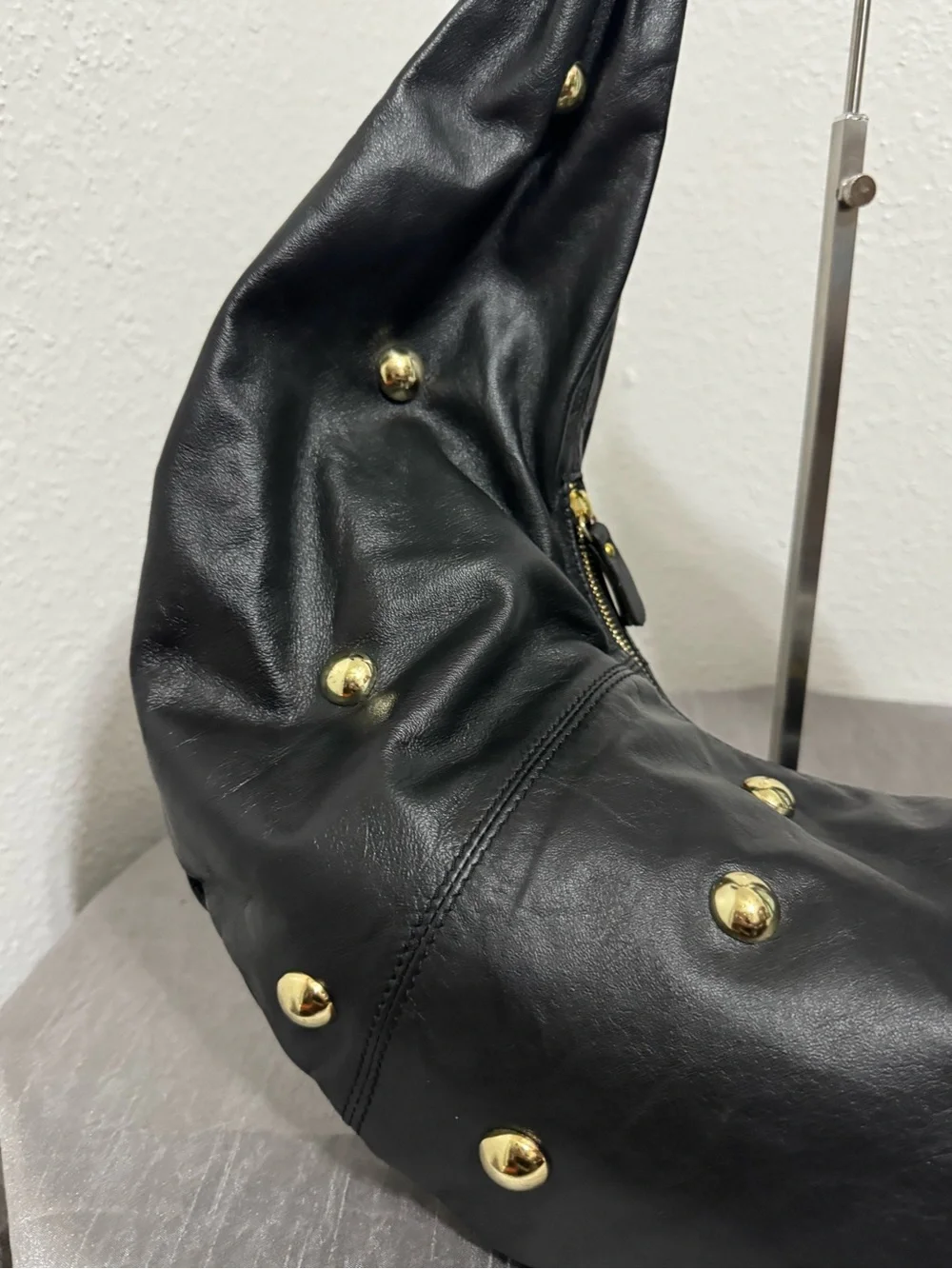 Chevignon Leather Black  Hobo with Gold Studded accents .